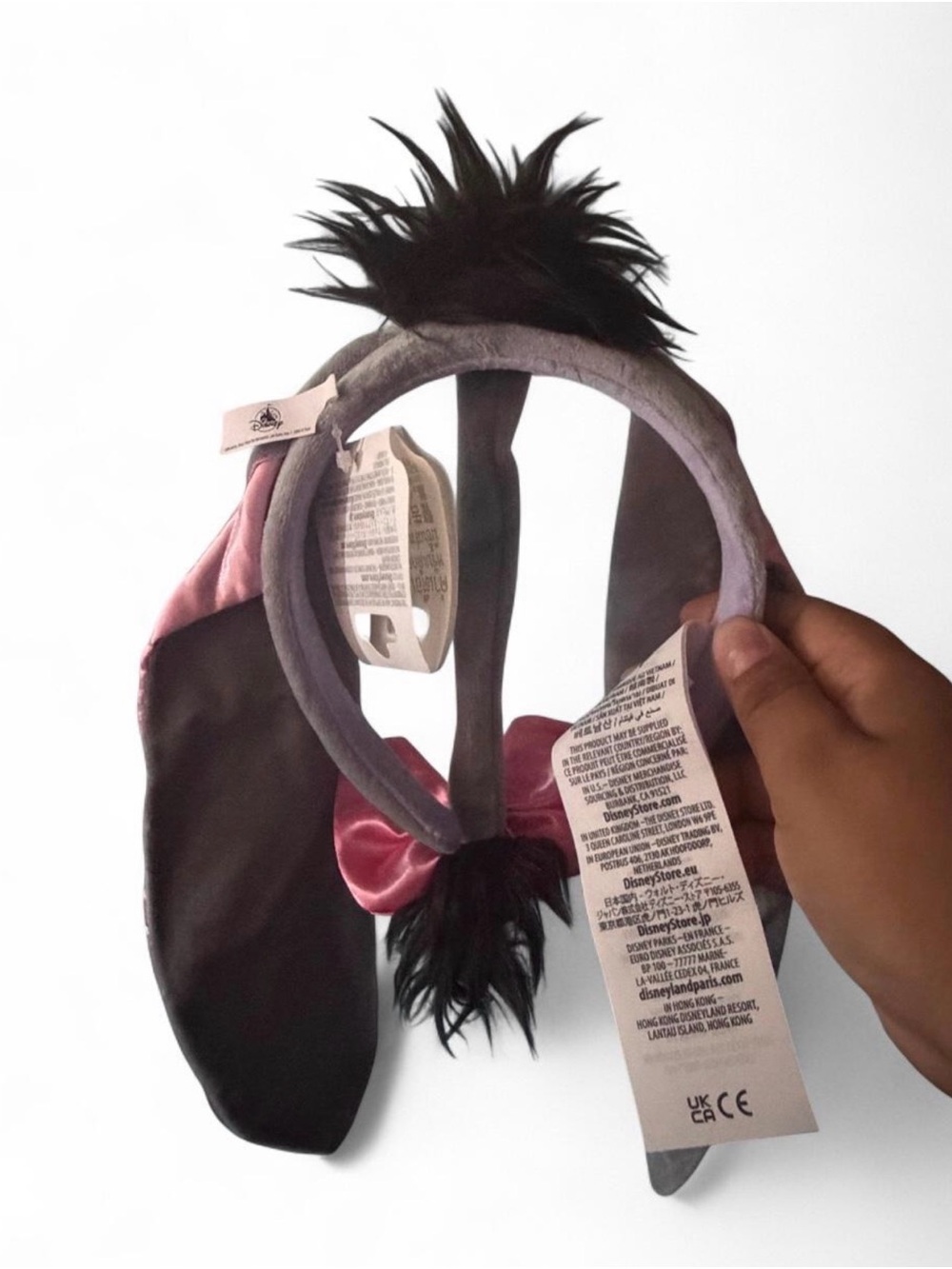 Disney Eeyore headband with pink bow and black fur